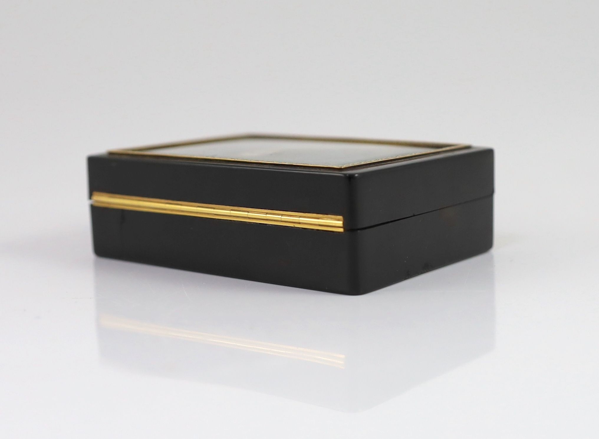 A 19th century Swiss gold mounted tortoiseshell snuff box, 9 x 6cm depth 2.5cm